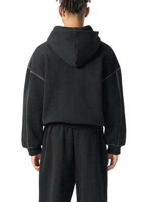 STILL. Contrast Stitch Boxy Zip Hoodie, worn by a model
