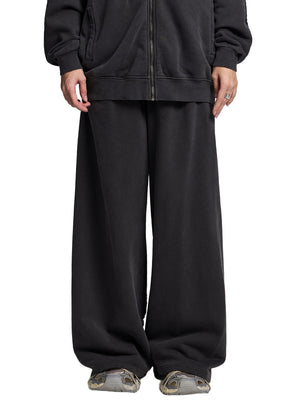 STILL. Vintage Washed Tape Raw Edge Sweatpants, worn by a model