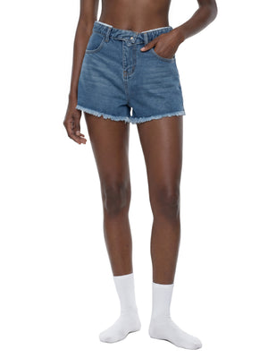 STILL. Women's High Rise Denim Shorts, worn by a model