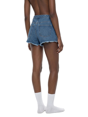 STILL. Women's High Rise Denim Shorts, worn by a model