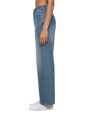 STILL. Women's Vintage Wash Wide Leg Jeans, worn by a model
