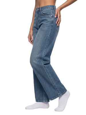 STILL. Women's Vintage Wash Wide Leg Jeans, worn by a model