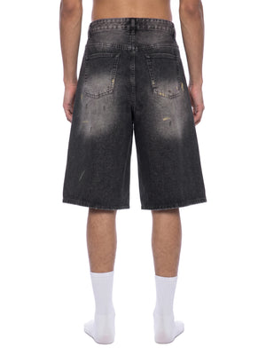 STILL. Men's Vintage Wash Denim Shorts, worn by a model
