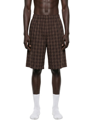 STILL. Plaid Wide Leg Shorts, worn by a model