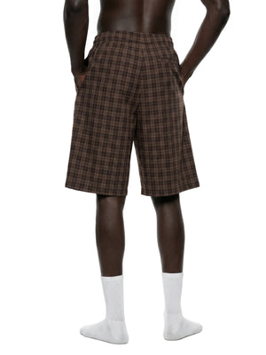 STILL. Plaid Wide Leg Shorts, worn by a model