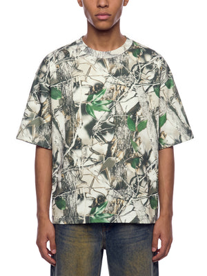 STILL. Unisex Tree Camo Boxy T-Shirt, worn by a model