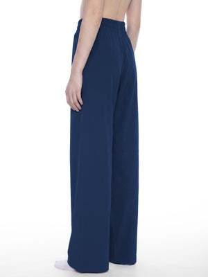 STILL. Women's High Waisted Wide Leg Yoga Pants, worn by a model