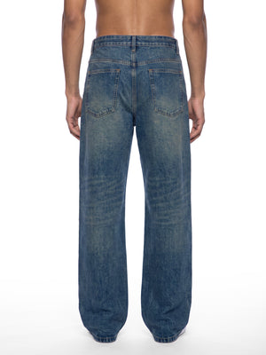 STILL. Men's Vintage Wash Straight Leg Jeans, worn by a model