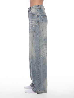 STILL. Women's Panelled Wide Leg Jeans, worn by a model