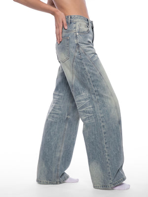 STILL. Women's Panelled Wide Leg Jeans, worn by a model