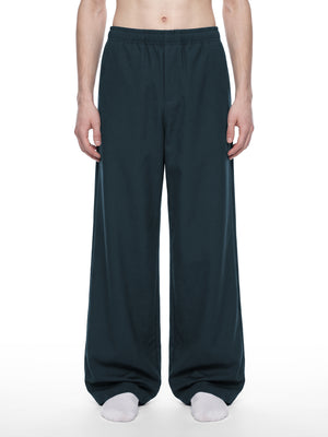 STILL. Men's Loose Straight Leg Pants, worn by a model