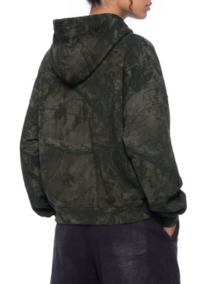 STILL. Unisex Waffle Tree Camo Boxy Hoodie, worn by a model