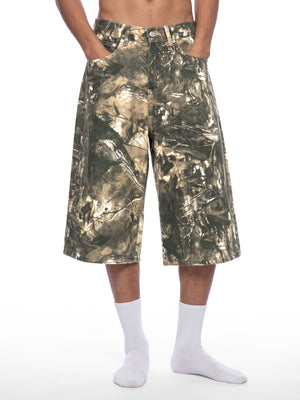 STILL. Men's Tree Camo Shorts, worn by a model