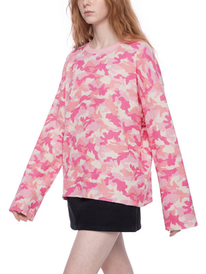 STILL. Unisex Camo Waffle Raw Edge Long Sleeve T-Shirt, worn by a model