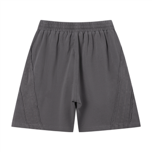 STILL. Vintage Wash Raw Edge Shorts — garment-washed cotton shorts with raw edge hems