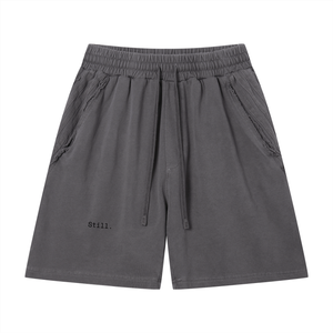 STILL. Vintage Wash Raw Edge Shorts — garment-washed cotton shorts with raw edge hems