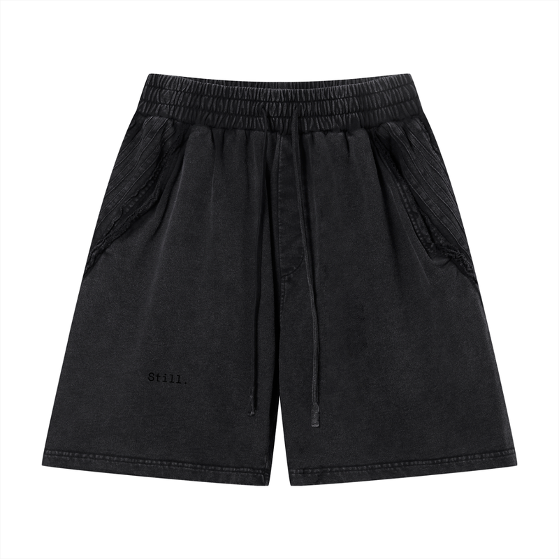 STILL. Vintage Wash Raw Edge Shorts — garment-washed cotton shorts with raw edge hems