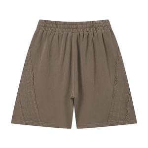 STILL. Vintage Wash Raw Edge Shorts — garment-washed cotton shorts with raw edge hems