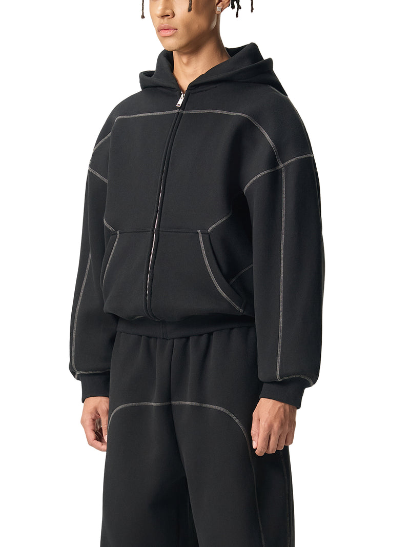 STILL. Contrast Stitch Boxy Zip Hoodie, worn by a model