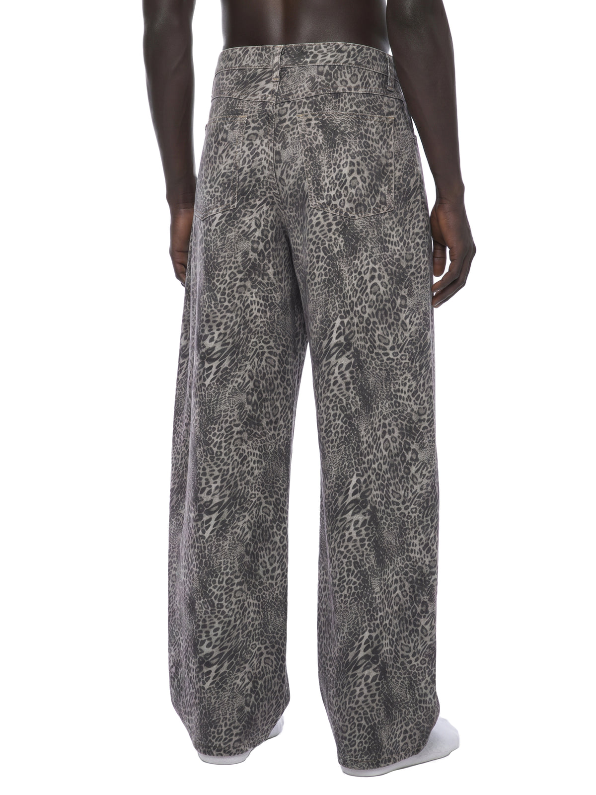 STILL. Leopard Wide Leg Jeans, worn by a model