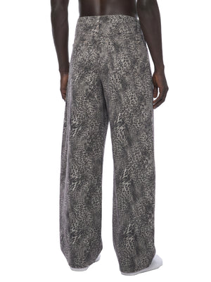 STILL. Leopard Wide Leg Jeans, worn by a model
