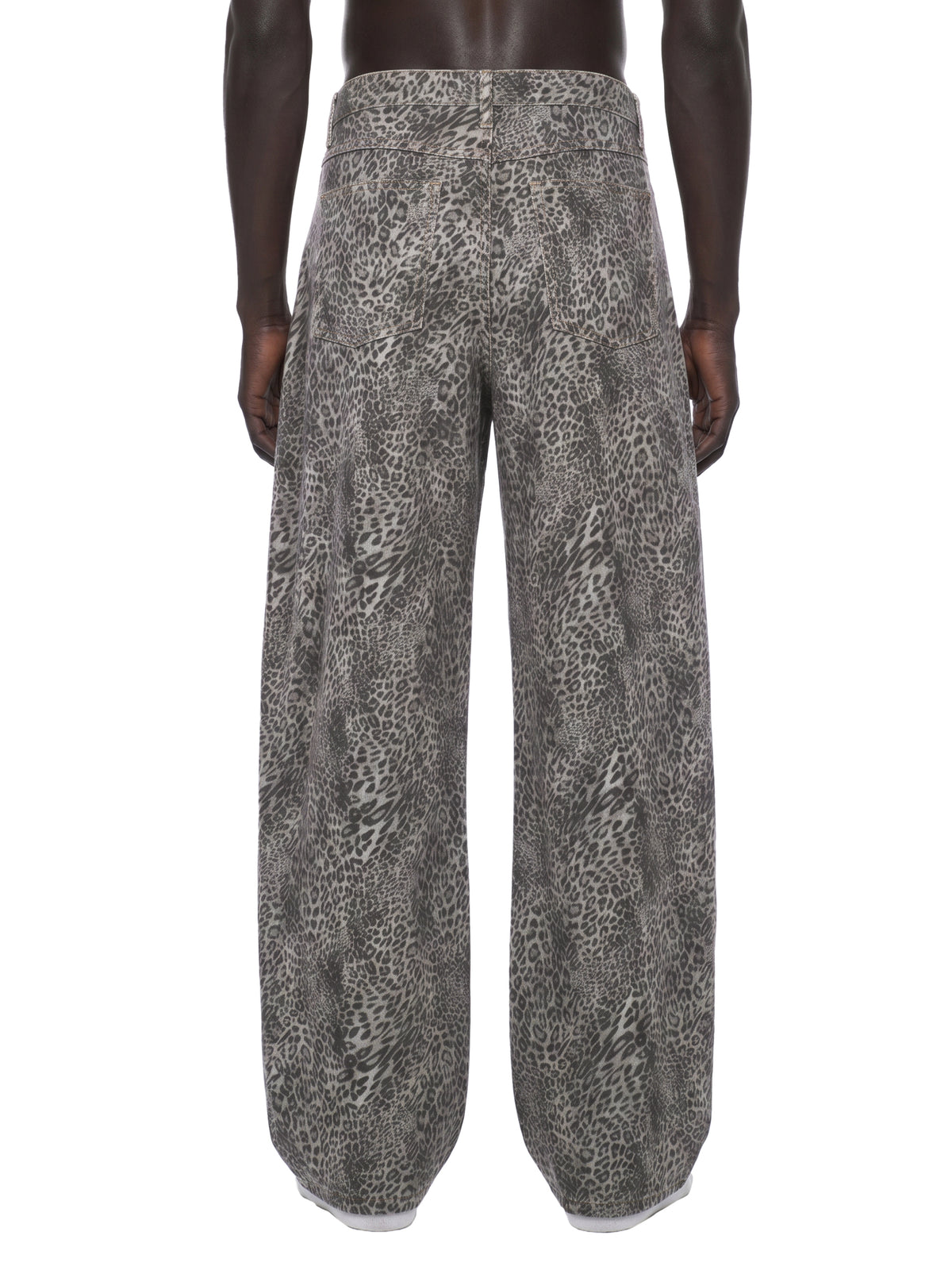 STILL. Leopard Wide Leg Jeans, worn by a model