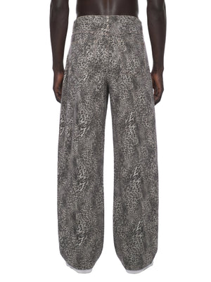 STILL. Leopard Wide Leg Jeans, worn by a model