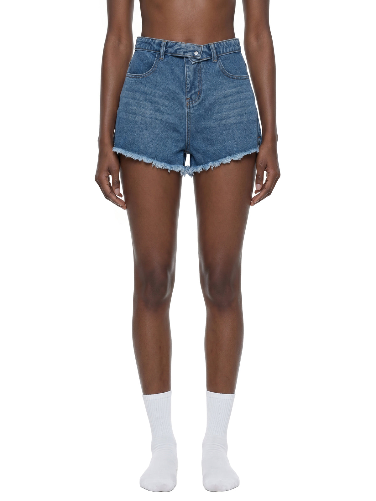 STILL. Women's High Rise Denim Shorts, worn by a model