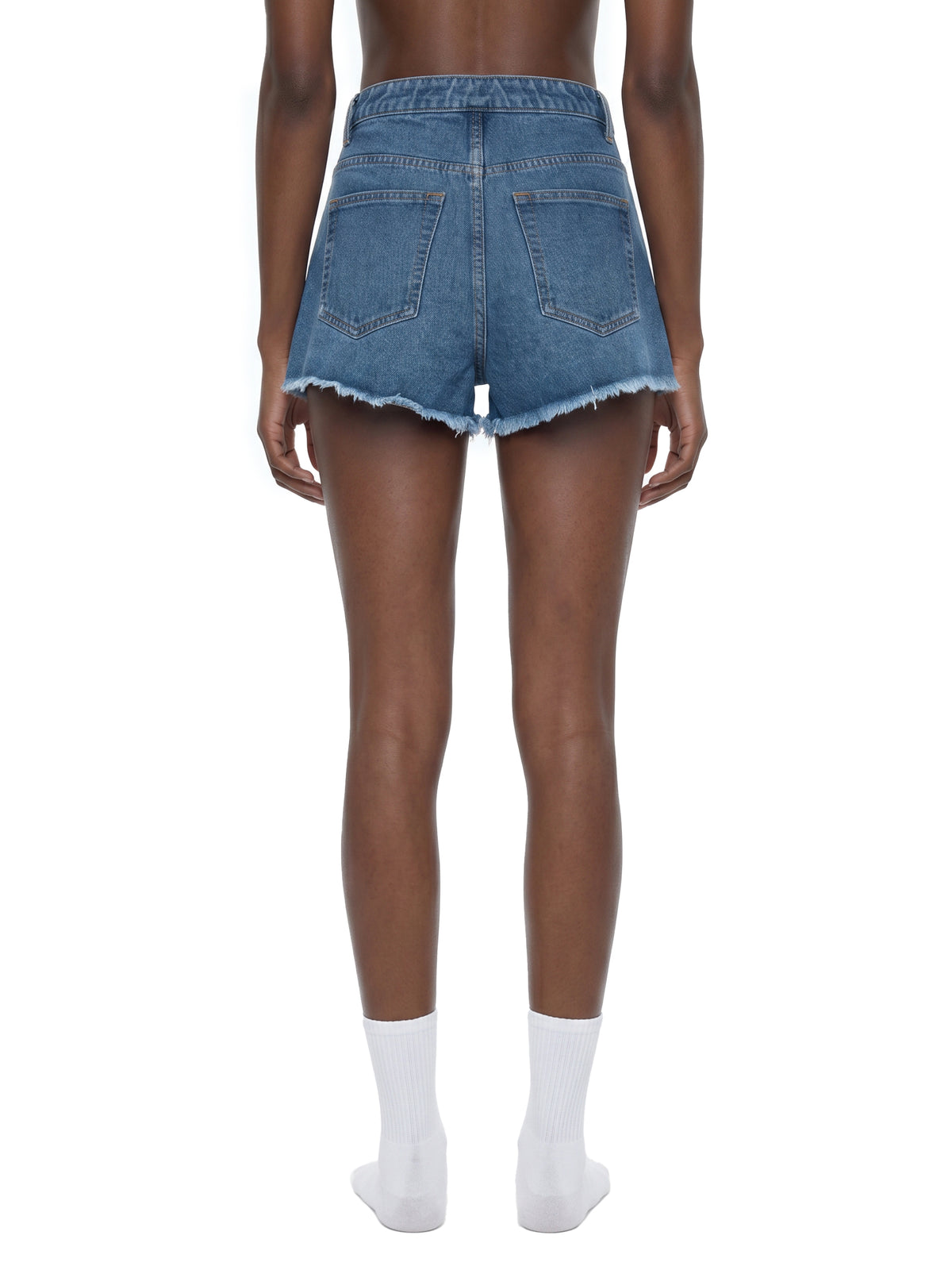 STILL. Women's High Rise Denim Shorts, worn by a model