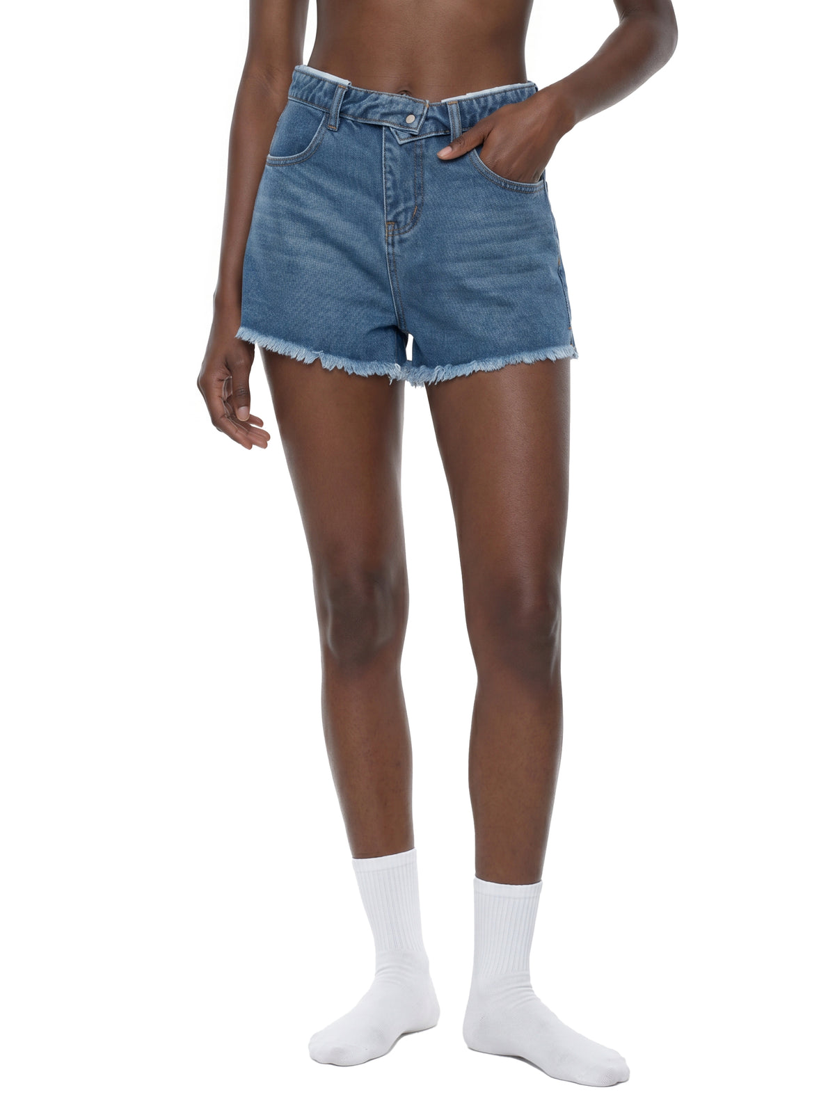 STILL. Women's High Rise Denim Shorts, worn by a model