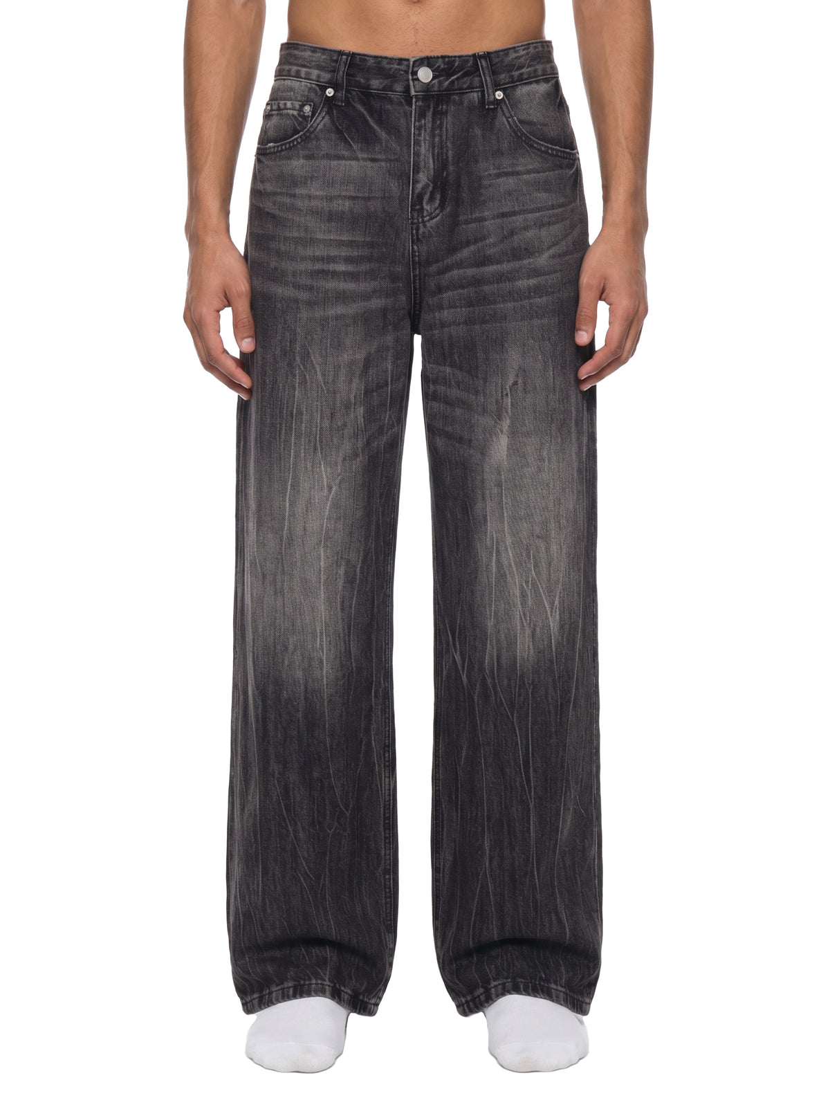 STILL. Men's Vintage Wash Wide Leg Jeans, worn by a model