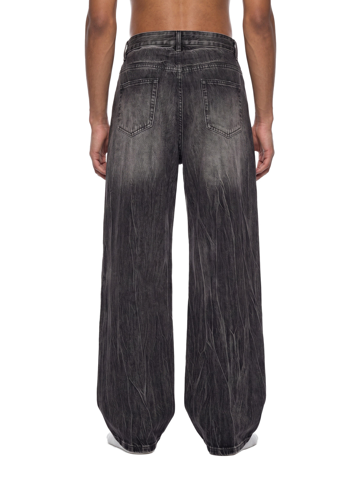 STILL. Men's Vintage Wash Wide Leg Jeans, worn by a model