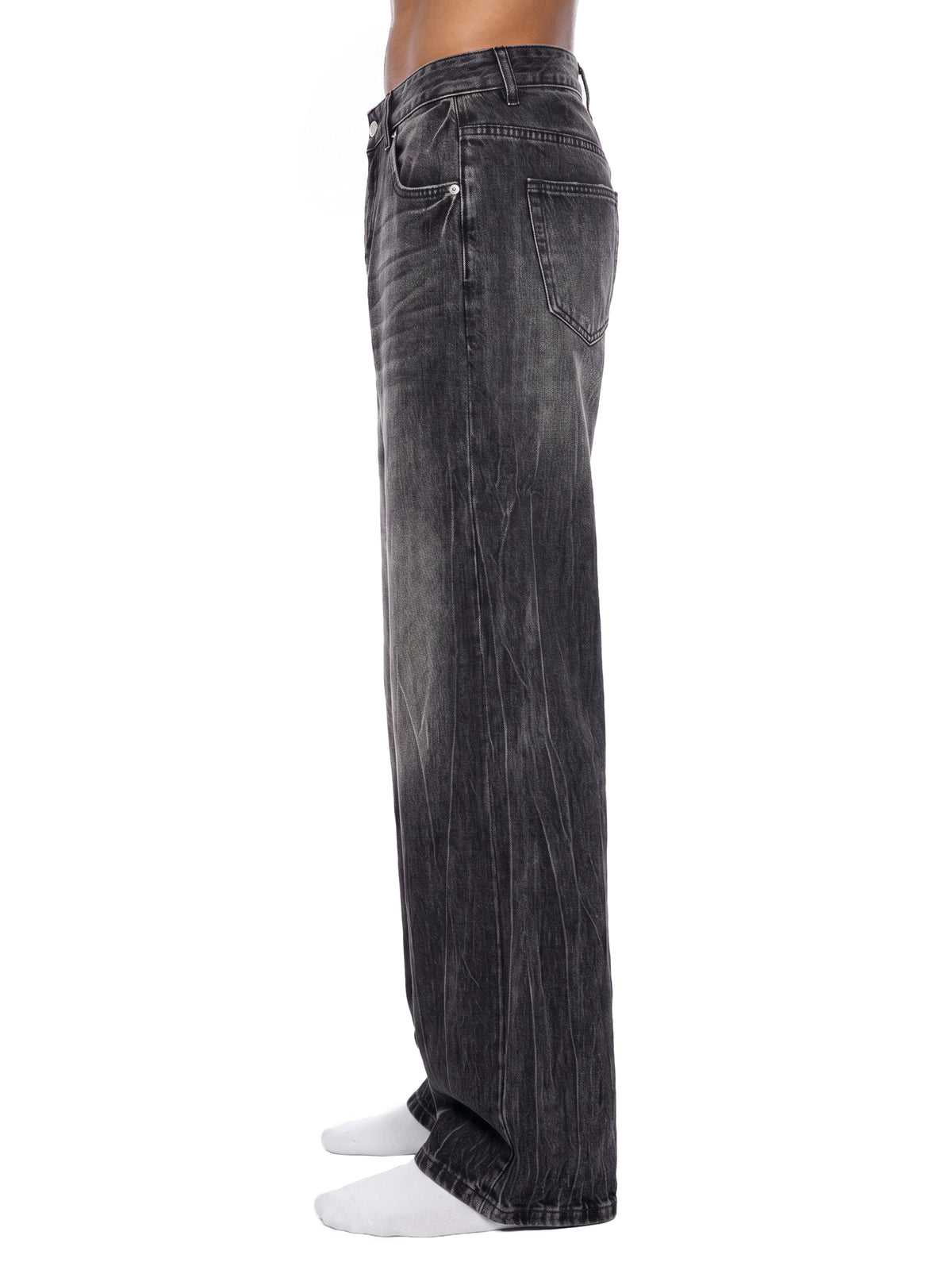 STILL. Men's Vintage Wash Wide Leg Jeans, worn by a model