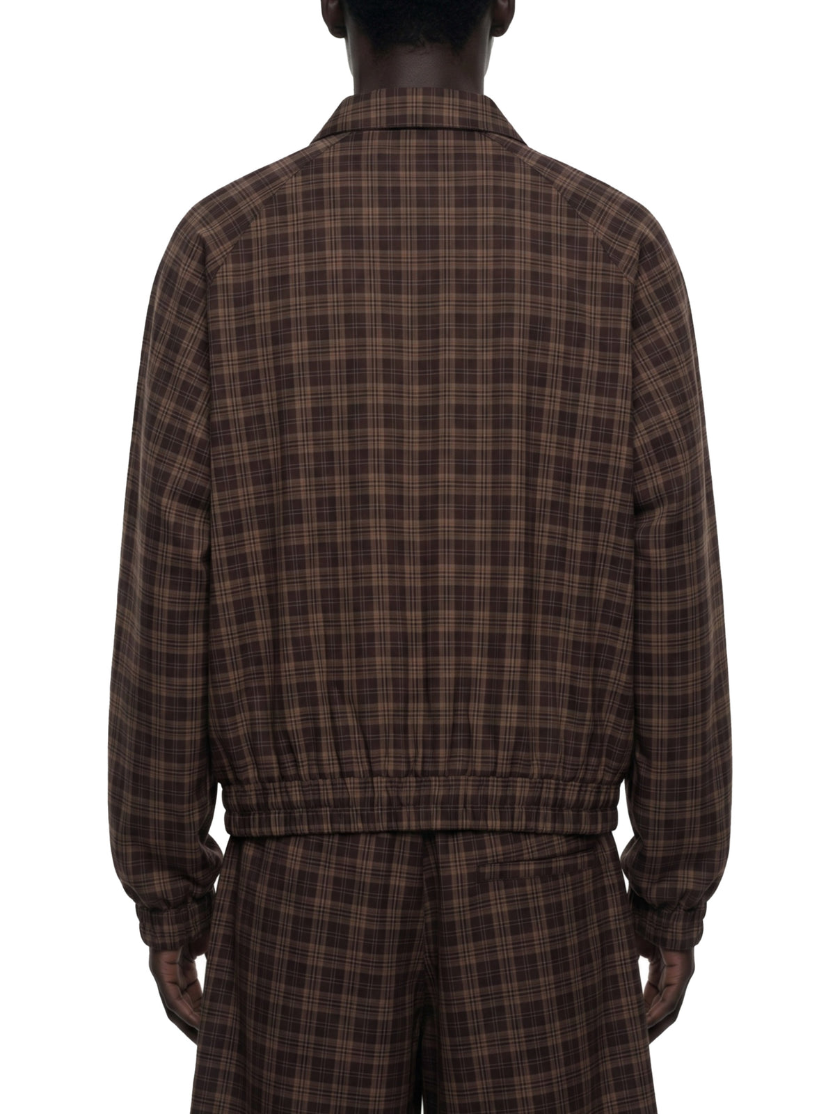 STILL. Plaid Zip Track Jacket, worn by a model