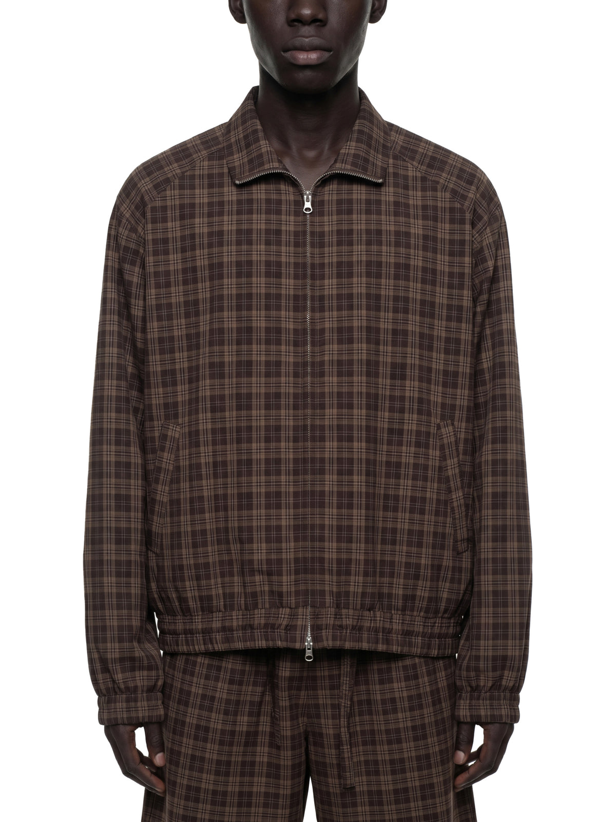 STILL. Plaid Zip Track Jacket, worn by a model