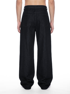 STILL. Men's Button Fly Wide Leg Jeans, worn by a model