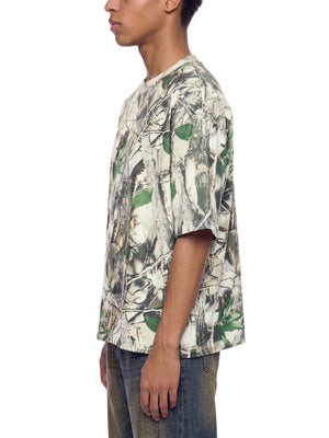 STILL. Unisex Tree Camo Boxy T-Shirt, worn by a model