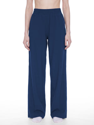 STILL. Women's High Waisted Wide Leg Yoga Pants, worn by a model