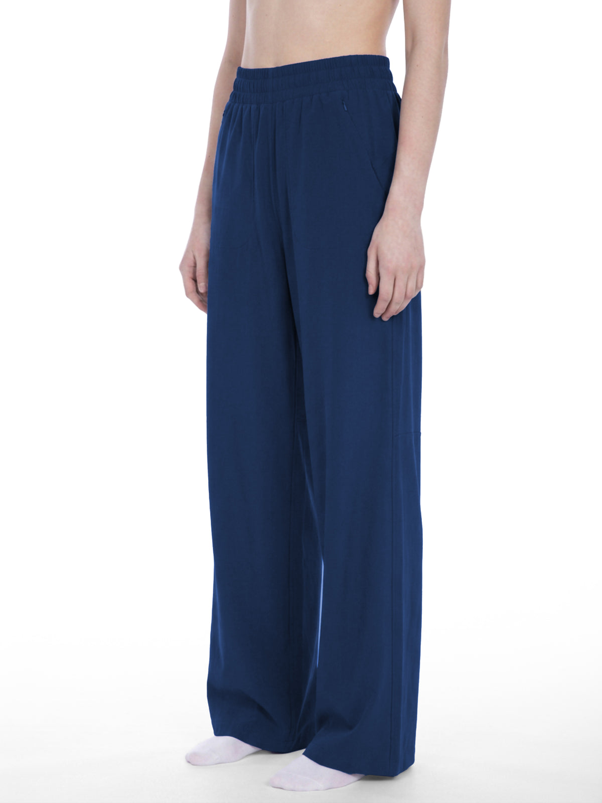 STILL. Women's High Waisted Wide Leg Yoga Pants, worn by a model