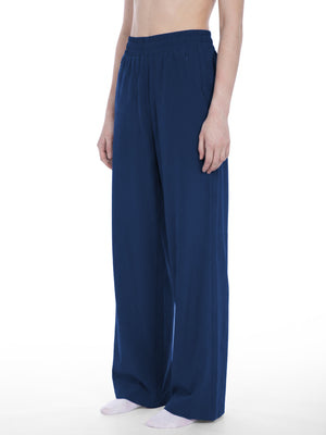 STILL. Women's High Waisted Wide Leg Yoga Pants, worn by a model