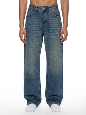 STILL. Men's Vintage Wash Straight Leg Jeans, worn by a model