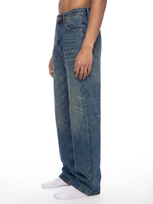 STILL. Men's Vintage Wash Straight Leg Jeans, worn by a model