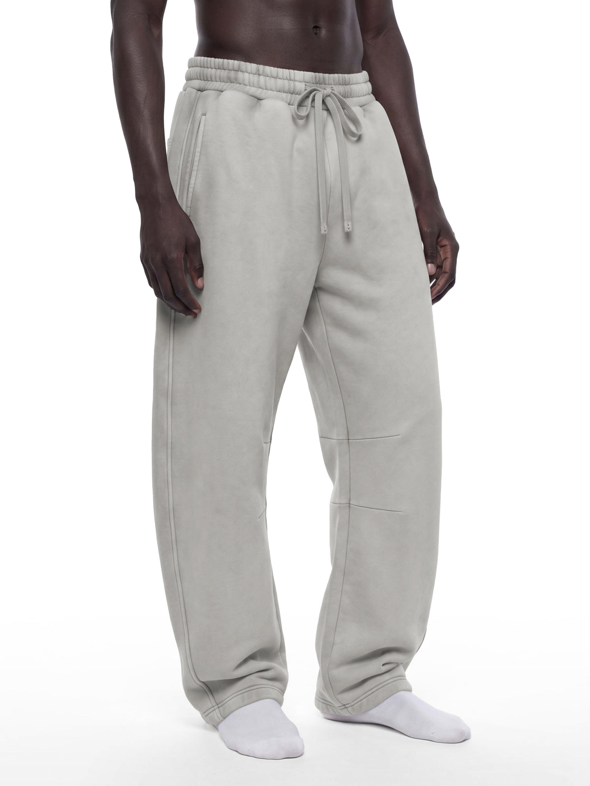 STILL. Unisex Vintage Wash Barrel Leg Fleece Sweatpants, worn by a model