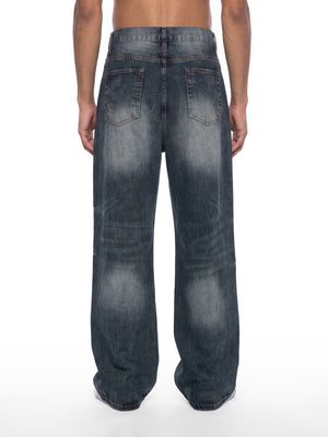 STILL. Men's Knee Fade Straight Leg Jeans, worn by a model