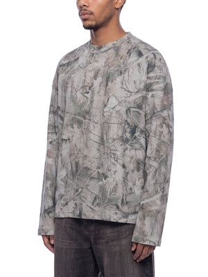 STILL. Unisex Tree Camo Waffle Long Sleeve T-Shirt, worn by a model