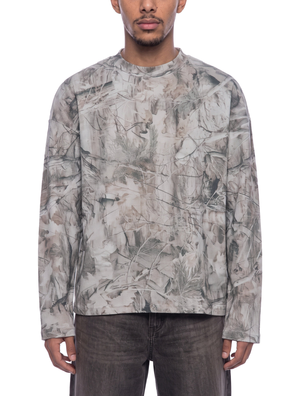 STILL. Unisex Tree Camo Waffle Long Sleeve T-Shirt, worn by a model