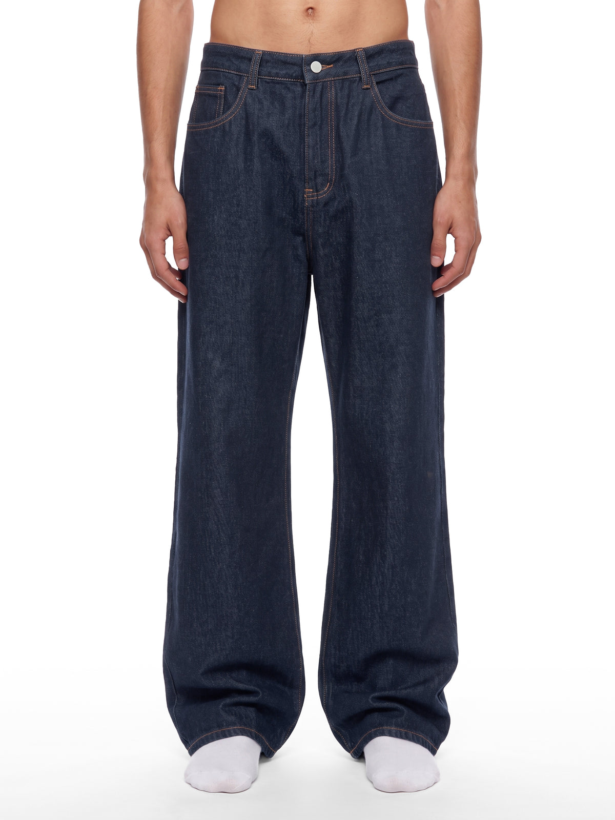 STILL. Men's Dark Indigo Loose Jeans, worn by a model