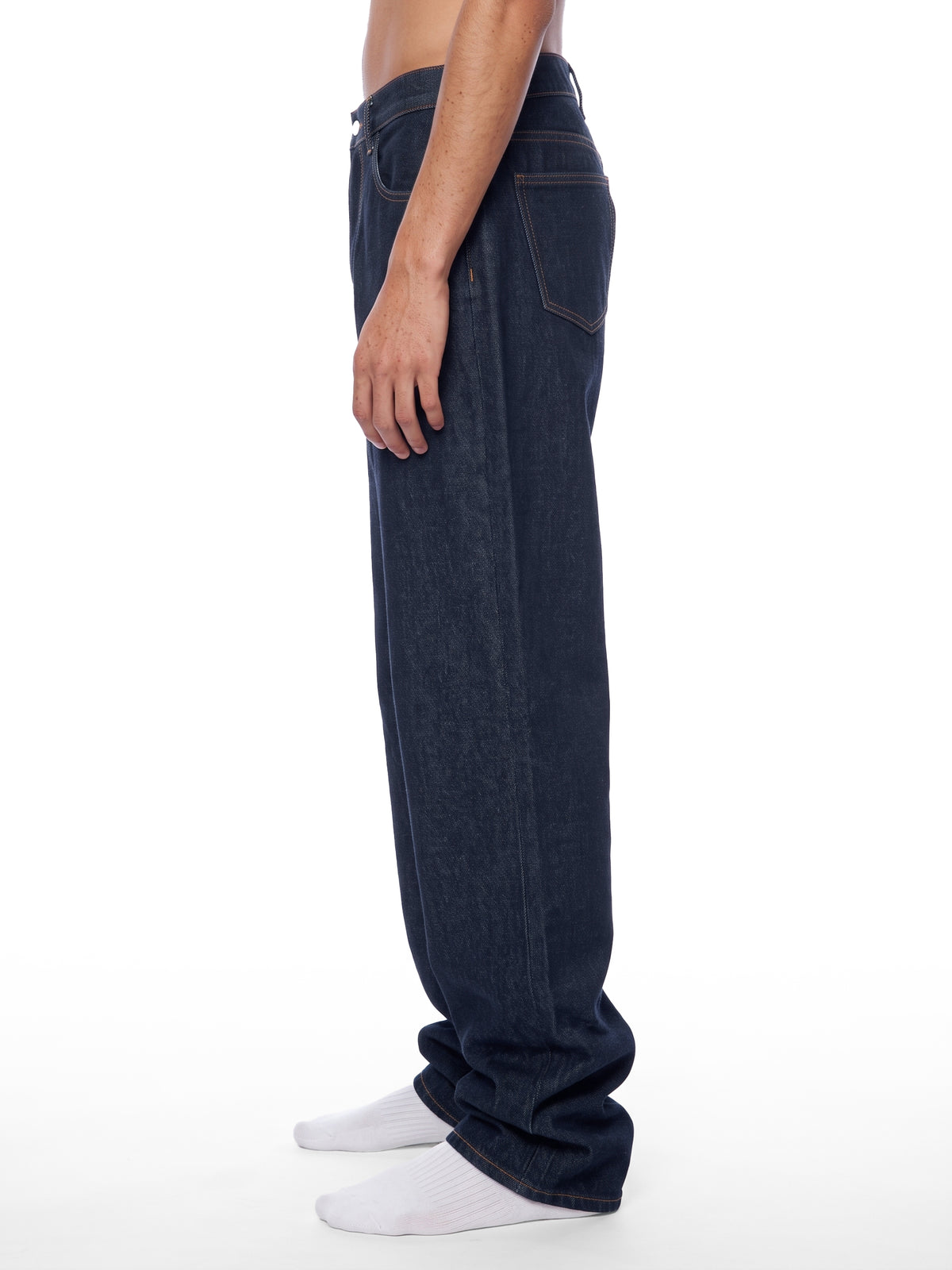 STILL. Men's Dark Indigo Loose Jeans, worn by a model