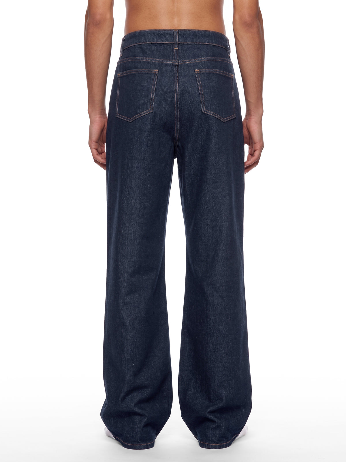 STILL. Men's Dark Indigo Loose Jeans, worn by a model
