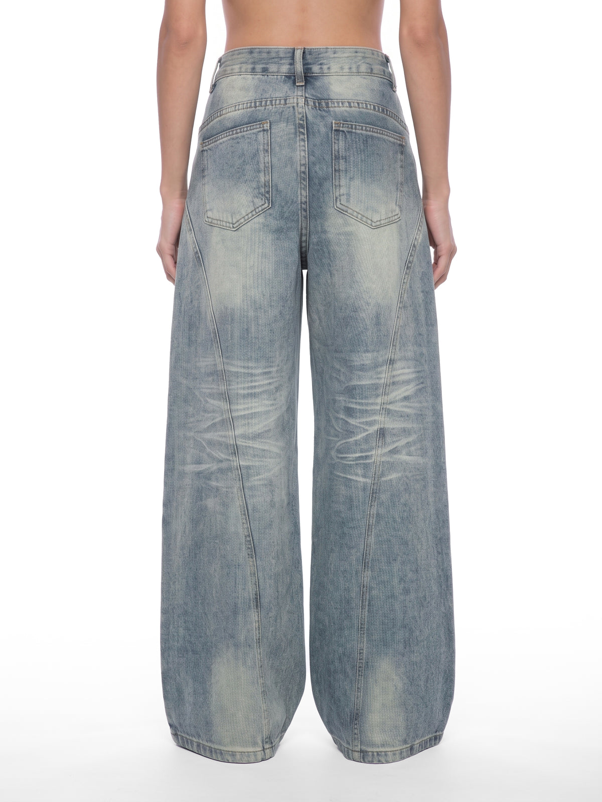 STILL. Women's Panelled Wide Leg Jeans, worn by a model